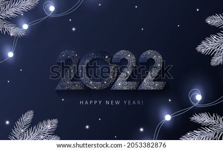 Happy New Year 2022 beautiful sparkling design of numbers on dark blue background with lights, pine branches and shining falling snow. Trendy modern winter banner, poster or greeting card template