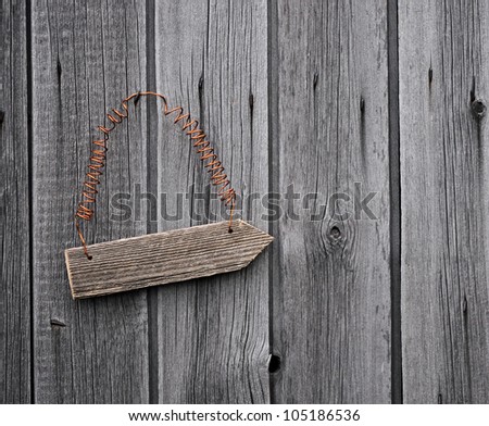 old sign on distressed wooden wall