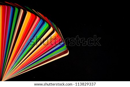 colorful color guide on black background with copy space