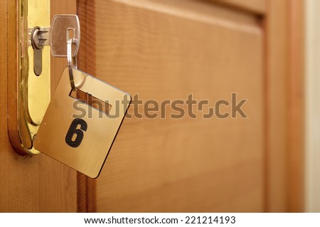 key in keyhole with numbered label