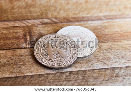 Cryptocurrency coins (Karbo aka Karbovanets) on the wooden desk Zdjęcia stock © 