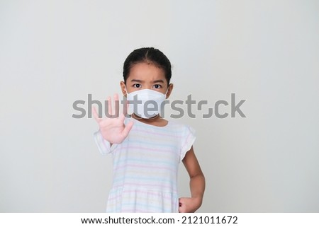 Image, Stock Photo angry kid wearing medical mask