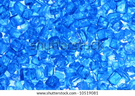 - macro of tiny blue twinkles/crystals (cake decor) - back-light - photos was not filtered at all and did not go through noise reduction