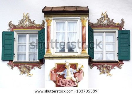 OBERAMMERGAU, GERMANY-JUNE 10: Unique houses. Houses are painted the religious themes.Some of the houses are painted with scenes from Little Red Riding Hood and ect;June 10,2012 Oberammergau,Germany