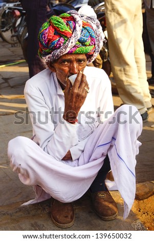 BUNDI, INDIA - JANUARY 23: Portrait of an old man in a traditional turban on the street of the city on January 23, 2012 in Bundi, India. Turbans reflect culture, profession of person.