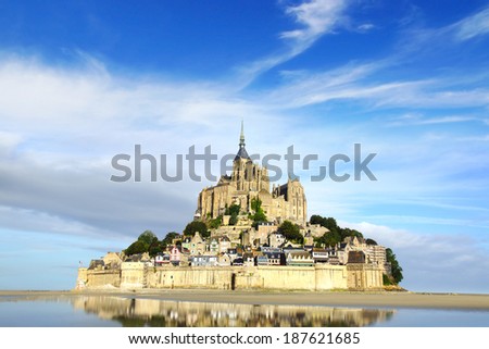 MONT SAINT-MICHEL, FRANCE - AUGUST 12, 2012: Mont Saint-Michel. One of France\'s most recognisable landmarks, Mont Saint-Michel and its bay are part of the UNESCO list of World Heritage Siteson.