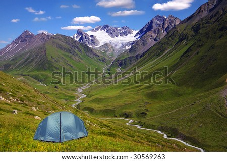 Mountain landscape with the tent