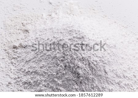 Calcium sulfide is a solid inorganic compound with the chemical formula CaS, used in the production of certain types of paints, ceramics and paper. Stock foto © 