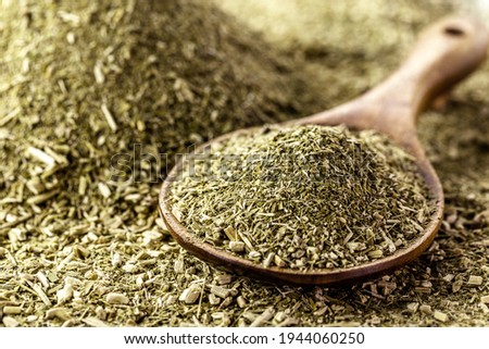 wooden spoon with yerba mate on background with herb Photo stock © 