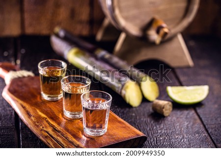 cups of cachaça, a Brazilian drink made from sugar cane, a Brazilian run popularly called "pinga", copy space