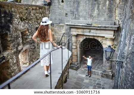 Similar – Foto Bild Frau auf dem Balkon mit Blick auf die Stadt von oben