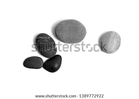 Similar – Image, Stock Photo Various pebbles on black sandy shore in sunlight