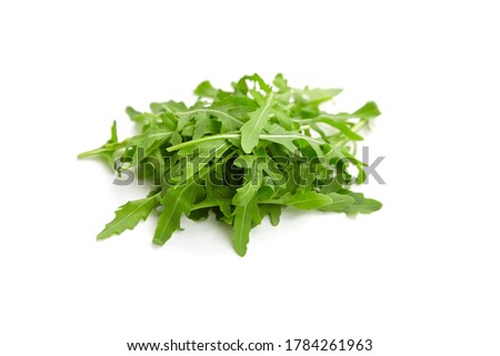 Fresh arugula or rucola leaves closeup isolated on white background 商業照片 © 