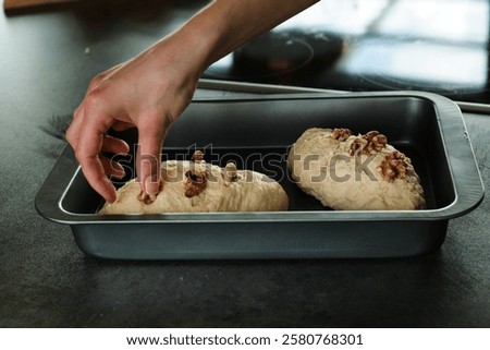 Similar – Image, Stock Photo Cooking doughnuts process. Homemade dough and deep-fried donuts, top view