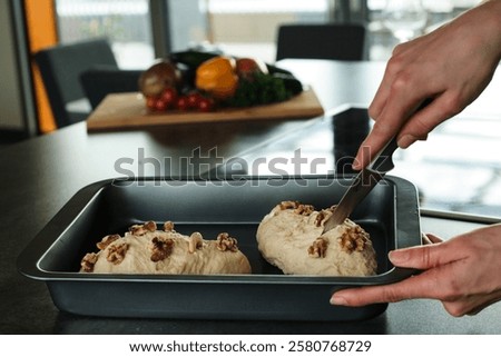 Similar – Image, Stock Photo Cooking doughnuts process. Homemade dough and deep-fried donuts, top view