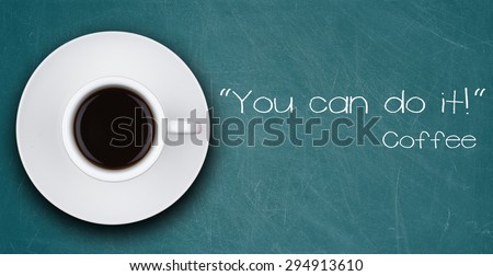 YOU CAN DO IT motivation quote and cup of coffee on a blackboard
