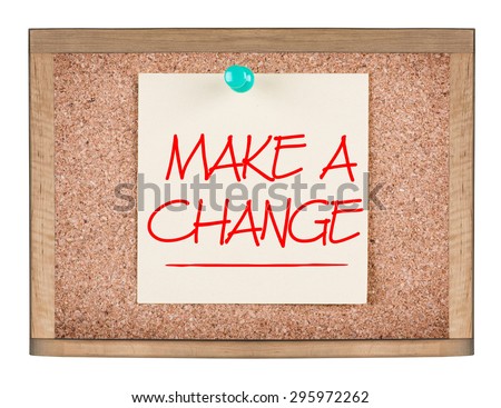 MAKE A CHANGE motivational quote written on a sticky note on corkboard. Isolated on a white background.