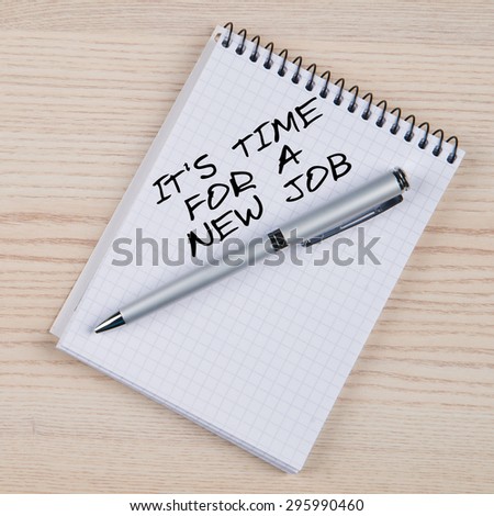 IT\'S TIME FOR A NEW JOB DO IT! motivational message written on a notepad
