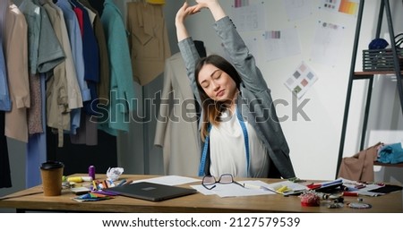 Similar – Image, Stock Photo Person sewing the spine of a book