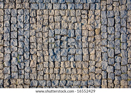 Cube stone structure of Prague pavement. Background texture.