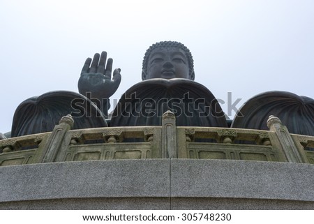 the statues of buddhist religious statues in tian tan buddha on top of ngong ping plateau in lantau island in china.
