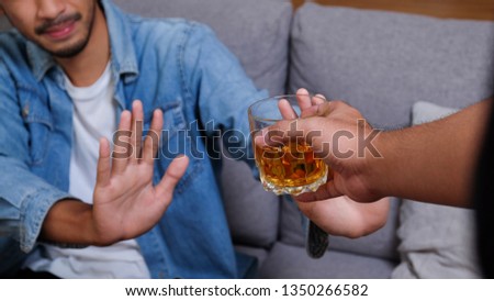 Similar – Image, Stock Photo Drunk alcoholic young girl lying on the floor feeling sick by drinking red wine, empty glass and bottle knock-out