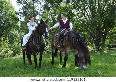 Princess bride and her knight on horses / wedding