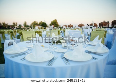Wedding Chairs and covers at an outdoor wedding