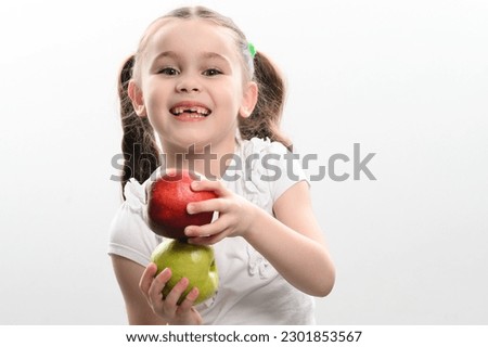 Similar – Image, Stock Photo little child holds two strawberries in his hands