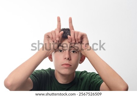Similar – Image, Stock Photo Boy looking at a smartphone