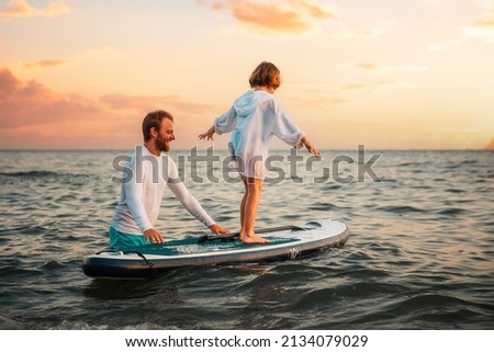 Similar – Foto Bild Mädchen auf einem Supermarkt am Ufer des Torre San Giovanni