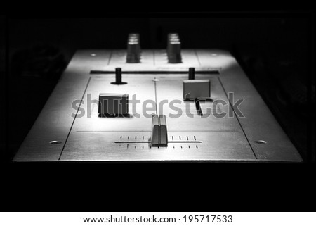 Two channels mixer for dj. Black and white image