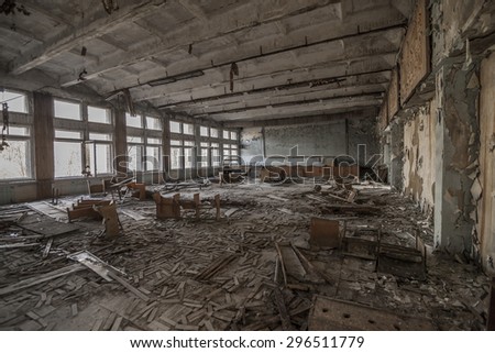 Wide-angle view of an abandoned classroom in a school of Pripyat. Chernobyl nuclear power plant zone of alienation