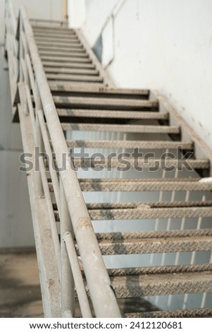 Similar – Image, Stock Photo Stairs with banister, door and ashtray in front of dirty wall