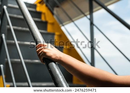 Similar – Image, Stock Photo The handrail up the stairs and the turquoise wall