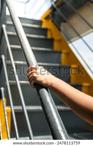 Similar – Image, Stock Photo The handrail up the stairs and the turquoise wall