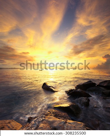 Beautiful scenery of sunset beach in Borneo .Warmer color of sunset.