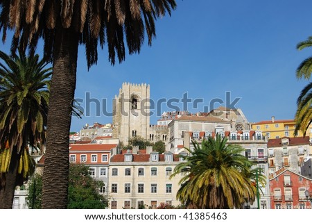 Lisbon cathedral with trees and buildings, Portugal, Europe
