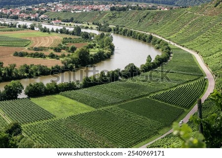 Similar – Foto Bild Ackerland umgeben von grünen Bäumen