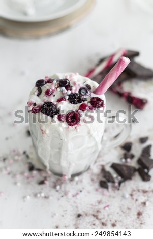 berry fruit natural ingredient milkshake and candy sprinkles