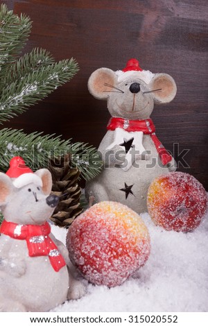Two Christmas Mice in snow with fir branch and sugar apple
