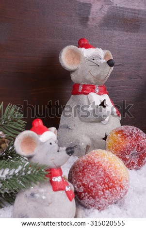 Two Christmas Mice in snow with fir branch and sugar apple