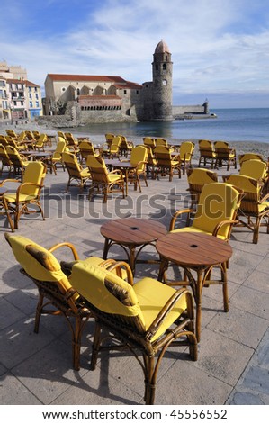 An outdoor dining area, harbor of Collioure