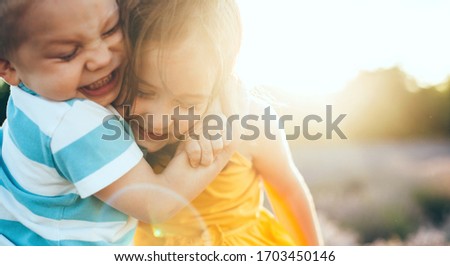 Similar – Image, Stock Photo Brother and sister playing outdoors