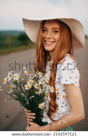 Similar – Image, Stock Photo Woman holding bouquet of fresh flowers against white wall