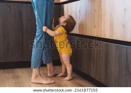 Similar – Image, Stock Photo Baby legs in jeans on pier