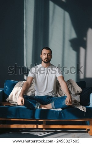 Similar – Image, Stock Photo Man meditating in Lotus pose