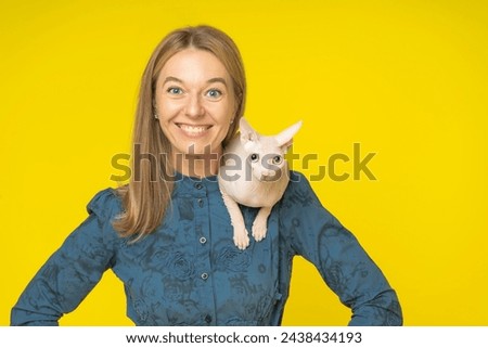 Similar – Image, Stock Photo Sphynx cat on shoulder of owner