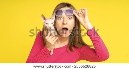 Similar – Image, Stock Photo Sphynx cat on shoulder of owner