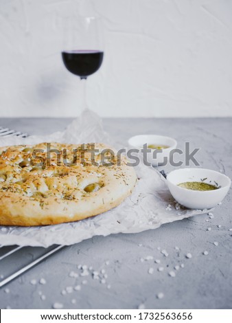 Similar – Foto Bild Hausgemachtes Rosmarin-Focaccia-Brot, Ansicht von oben, Nahaufnahme.